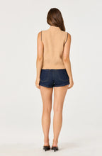 Load image into Gallery viewer, Woman wearing a beige sleeveless knitted ASTR cardigan with tie neck and buttons on a white background